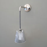 Luxury Polished Nickel Hanging Wall Light on Grey Wall with Fluted Glass Shade