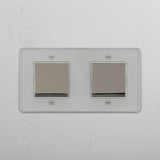 Modern Double Rocker Switch in Clear Polished Nickel White - Versatile Light Control Tool on White Background